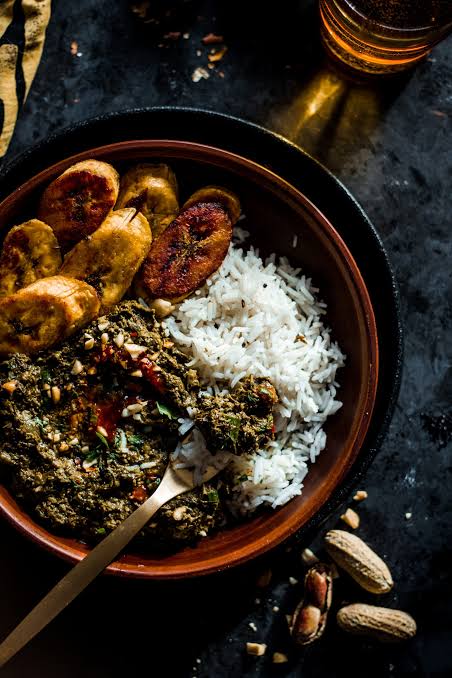 A plate of stew served with rice