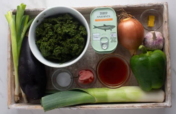 Hands preparing ingredients on a kitchen counter